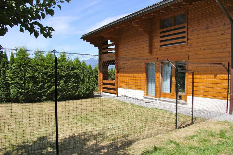 cat fencing around an entire house