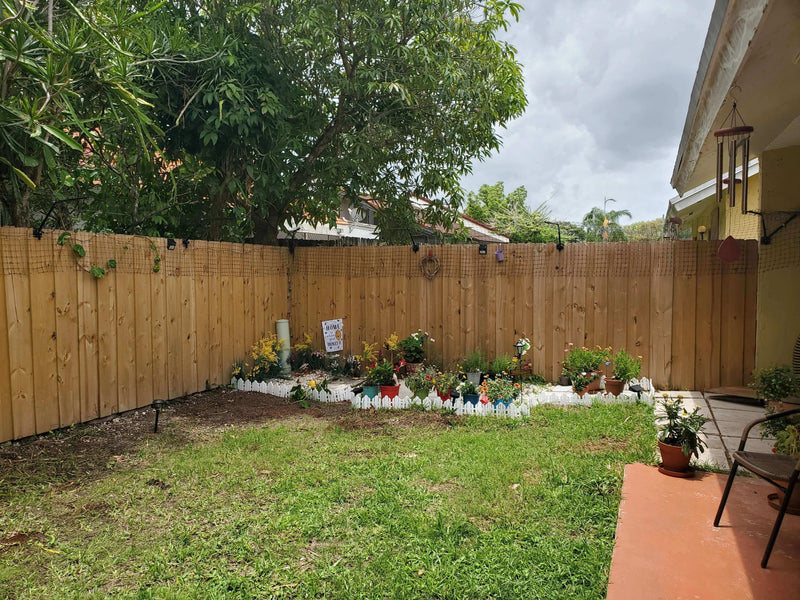 fencing a backyard to keep cat contained