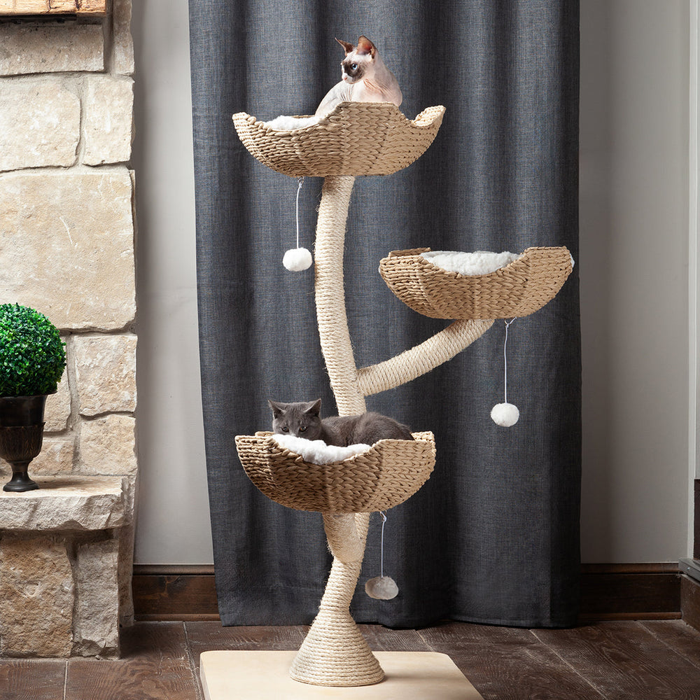 Two Cats laying in the basket beds of the Sanctuary Cat Tree by Habitat Haven